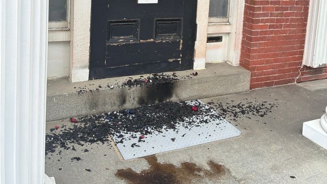 Image for gallery: Arson investigation underway after American flag burned at Bath Masonic Temple